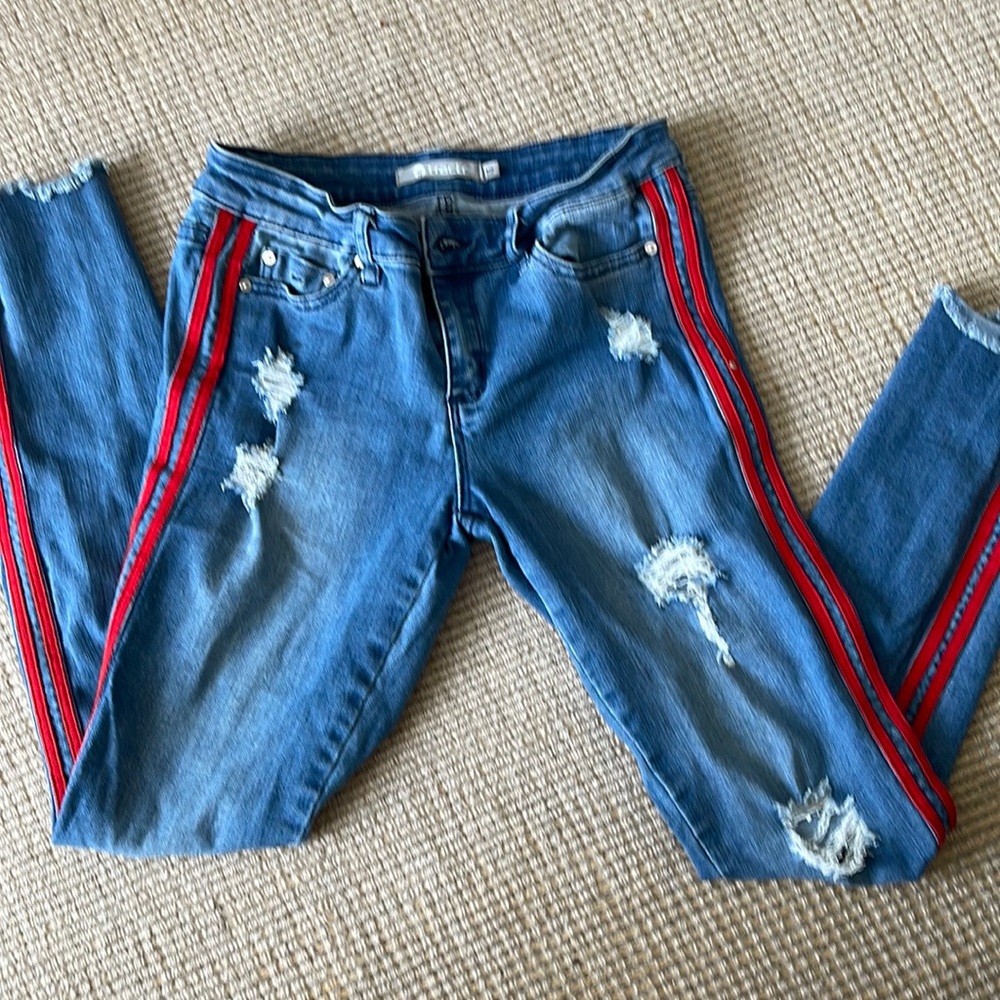 Tractr Distressed jeans size 12 with red striped piping down the side
